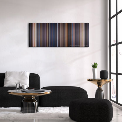 Deep Impact color palette canvas above a black sofa with a gold-topped table
