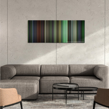 The Matrix Reloaded color palette canvas on a concrete wall above a gray sectional sofa