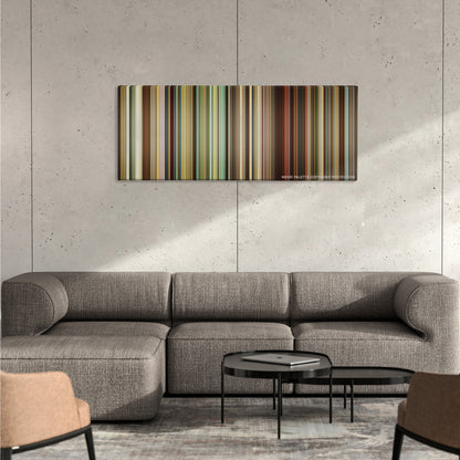Dallas Buyers Club color palette canvas on a concrete wall above a gray sectional sofa