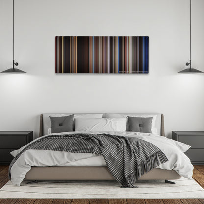 The Notebook color palette canvas above a bed, between two black pendant lamps