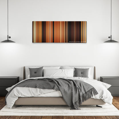 Coherence color palette canvas above a bed, between two black pendant lamps