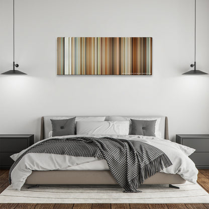 The Holiday color palette canvas above a bed, between two black pendant lamps