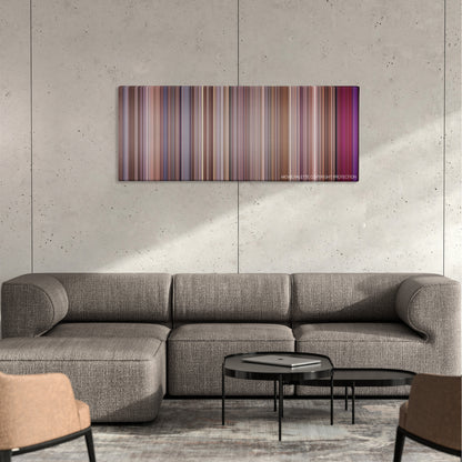Rat Race color palette canvas on a concrete wall above a gray sectional sofa