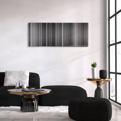 Metropolis color palette canvas above a black sofa with a gold-topped table