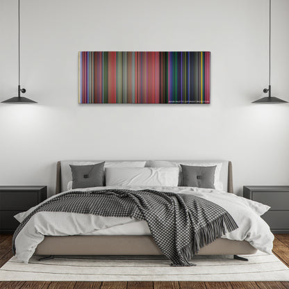 Sleeping Beauty color palette canvas above a bed, between two black pendant lamps