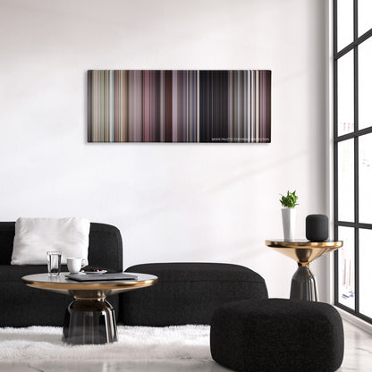 The Whole Nine Yards color palette canvas above a black sofa with a gold-topped table