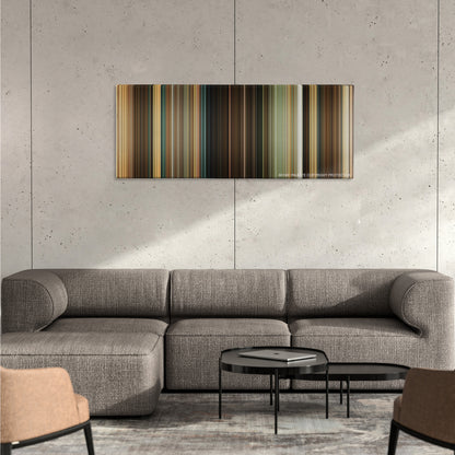 Indiana Jones and the Kingdom of the Crystal Skull color palette canvas on a concrete wall above a gray sectional sofa