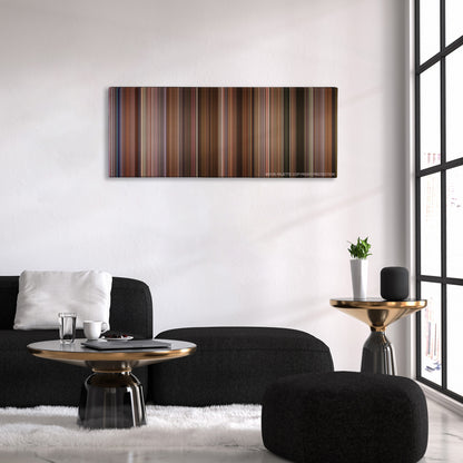 Jerry Maguire color palette canvas above a black sofa with a gold-topped table
