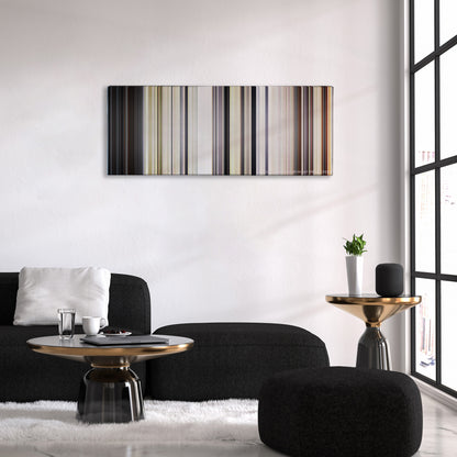 Midsommar color palette canvas above a black sofa with a gold-topped table