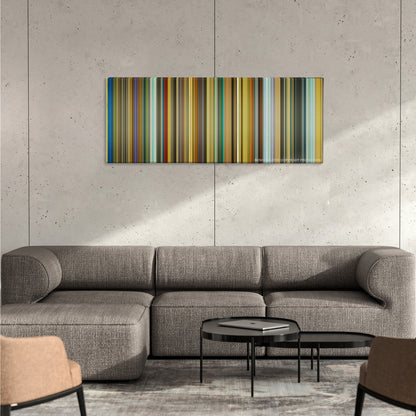 The Theory of Everything color palette canvas on a concrete wall above a gray sectional sofa