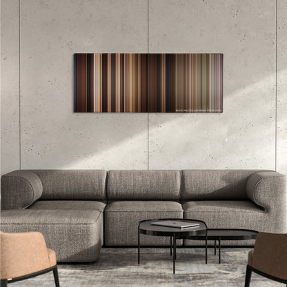 Back to the Future Part III color palette canvas on a concrete wall above a gray sectional sofa