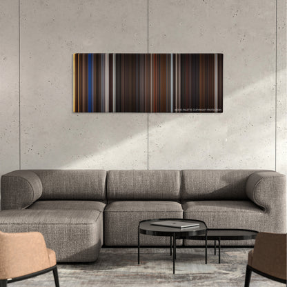 Night at the Museum: Secret of the Tomb color palette canvas on a concrete wall above a gray sectional sofa