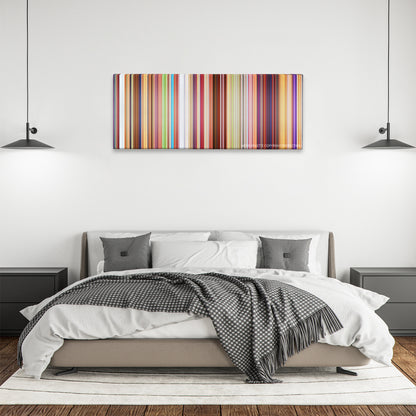 The Boss Baby color palette canvas above a bed, between two black pendant lamps