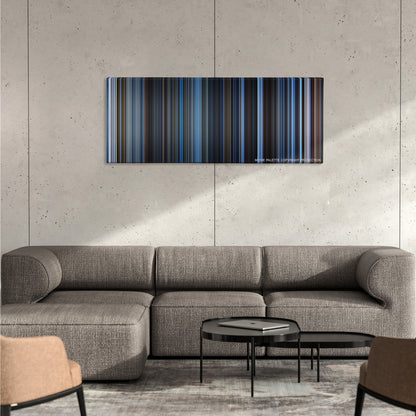 The Day After Tomorrow color palette canvas on a concrete wall above a gray sectional sofa