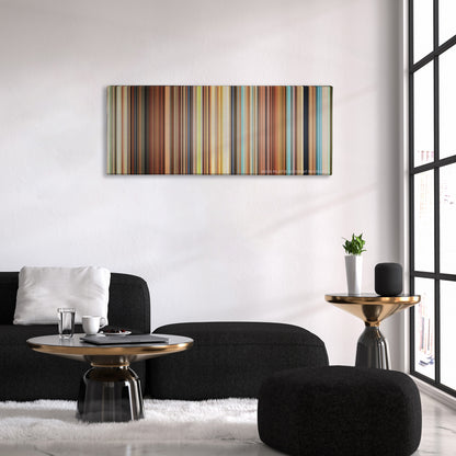Spirited Away color palette canvas above a black sofa with a gold-topped table