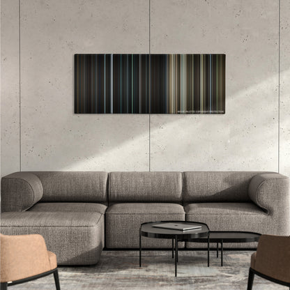 The Da Vinci Code color palette canvas on a concrete wall above a gray sectional sofa