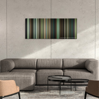 Out of the Furnace color palette canvas on a concrete wall above a gray sectional sofa
