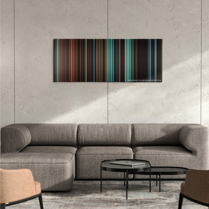 Cloverfield color palette canvas on a concrete wall above a gray sectional sofa