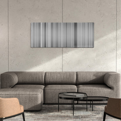 Mr. Smith Goes to Washington color palette canvas on a concrete wall above a gray sectional sofa