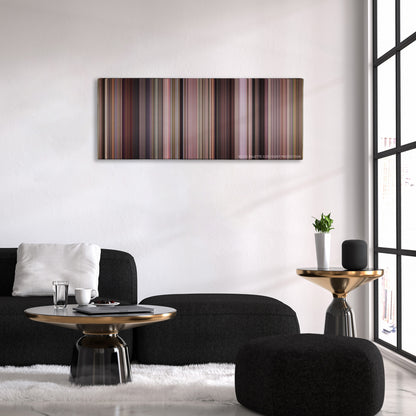 Road Trip color palette canvas above a black sofa with a gold-topped table