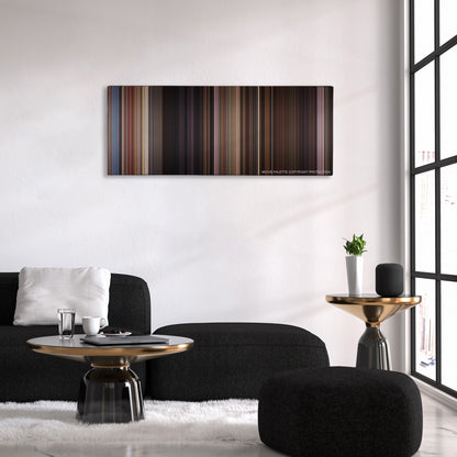 Horrible Bosses 2 color palette canvas above a black sofa with a gold-topped table