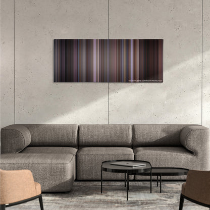 American Pie color palette canvas on a concrete wall above a gray sectional sofa