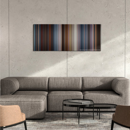 Terminator 3: Rise of the Machines color palette canvas on a concrete wall above a gray sectional sofa