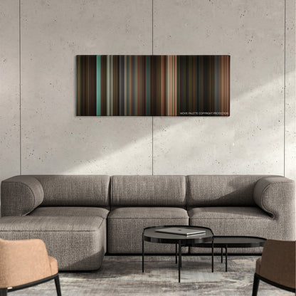 Street Kings color palette canvas on a concrete wall above a gray sectional sofa