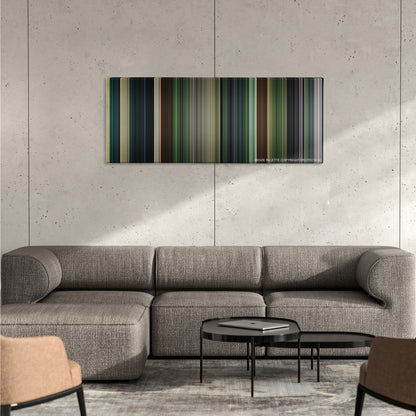 Platoon color palette canvas on a concrete wall above a gray sectional sofa