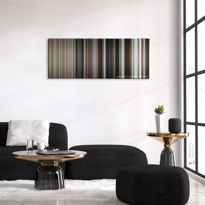 Wild Things color palette canvas above a black sofa with a gold-topped table