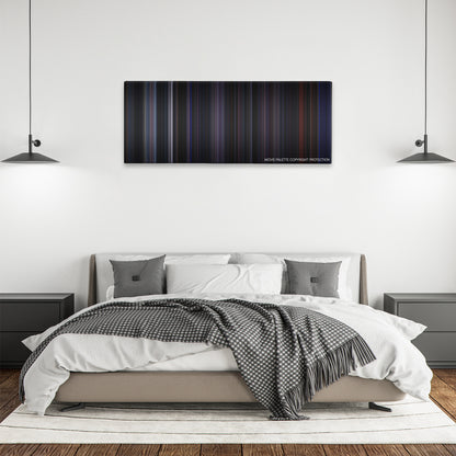 Doom color palette canvas above a bed, between two black pendant lamps