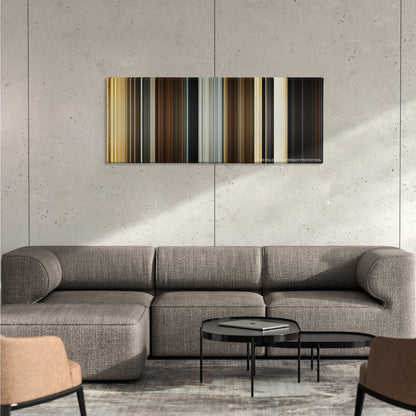 Spectre color palette canvas on a concrete wall above a gray sectional sofa