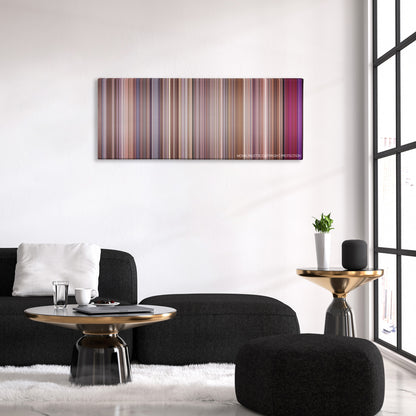 Rat Race color palette canvas above a black sofa with a gold-topped table