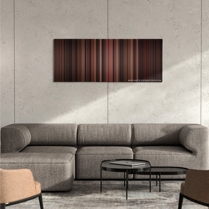 The Godfather: Part III color palette canvas on a concrete wall above a gray sectional sofa