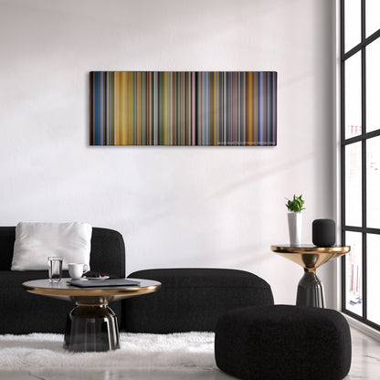 American Made color palette canvas above a black sofa with a gold-topped table