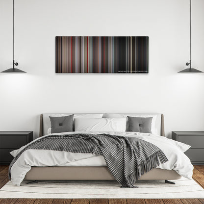 The Omen color palette canvas above a bed, between two black pendant lamps