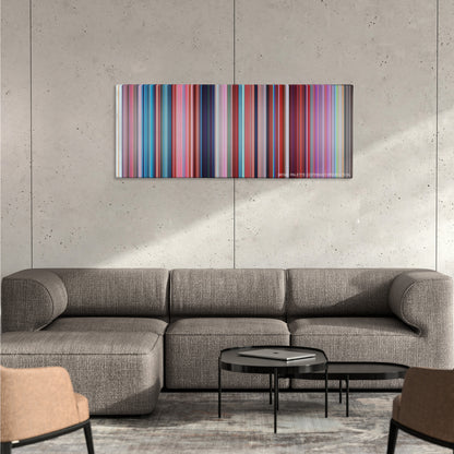 Despicable Me 2 color palette canvas on a concrete wall above a gray sectional sofa