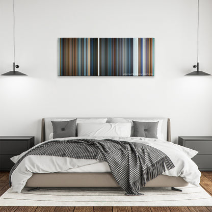What Happened to Monday color palette canvas above a bed, between two black pendant lamps