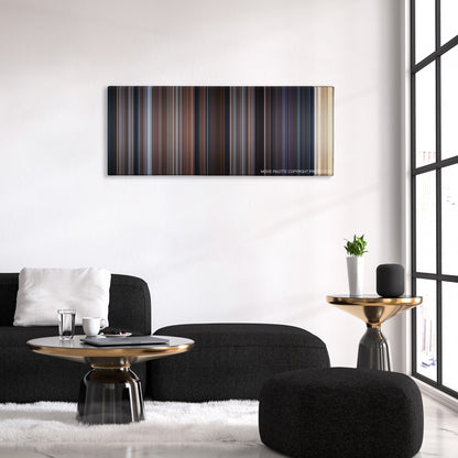 Entrapment color palette canvas above a black sofa with a gold-topped table