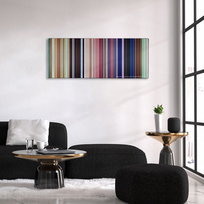 Moana color palette canvas above a black sofa with a gold-topped table