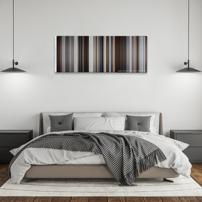 Fargo color palette canvas above a bed, between two black pendant lamps