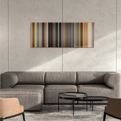 22 Jump Street color palette canvas on a concrete wall above a gray sectional sofa