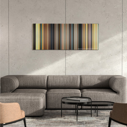 127 Hours color palette canvas on a concrete wall above a gray sectional sofa