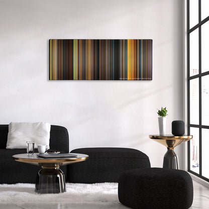 Dune color palette canvas above a black sofa with a gold-topped table