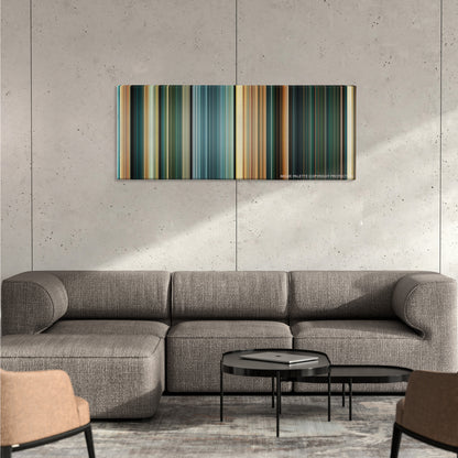 Furious 7 color palette canvas on a concrete wall above a gray sectional sofa