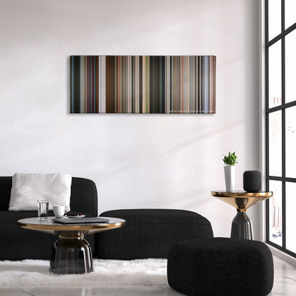Mission: Impossible - Fallout color palette canvas above a black sofa with a gold-topped table