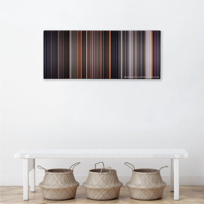 E.T. the Extra-Terrestrial color palette canvas above a white bench with three woven baskets