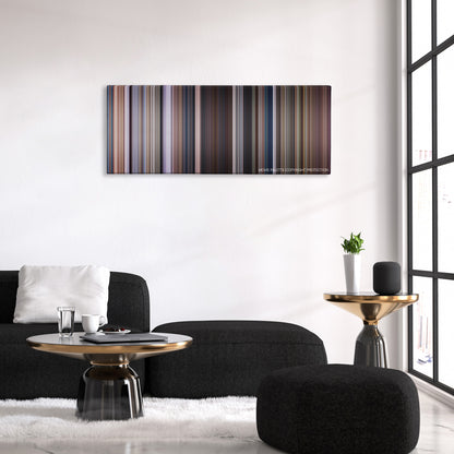 Men of Honor color palette canvas above a black sofa with a gold-topped table