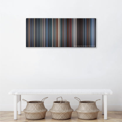 Demolition Man color palette canvas above a white bench with three woven baskets