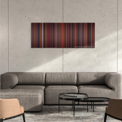 Die Hard 2 color palette canvas on a concrete wall above a gray sectional sofa